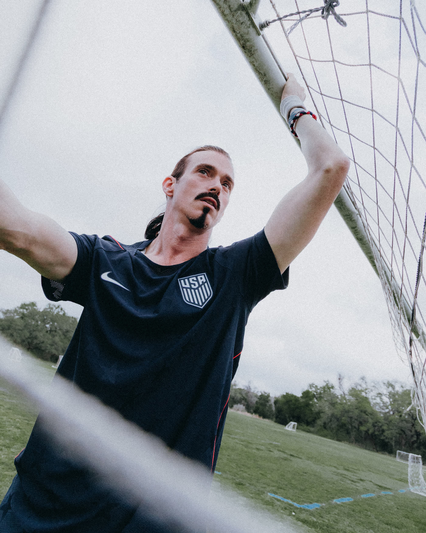 USMNT training top editorial through goal net